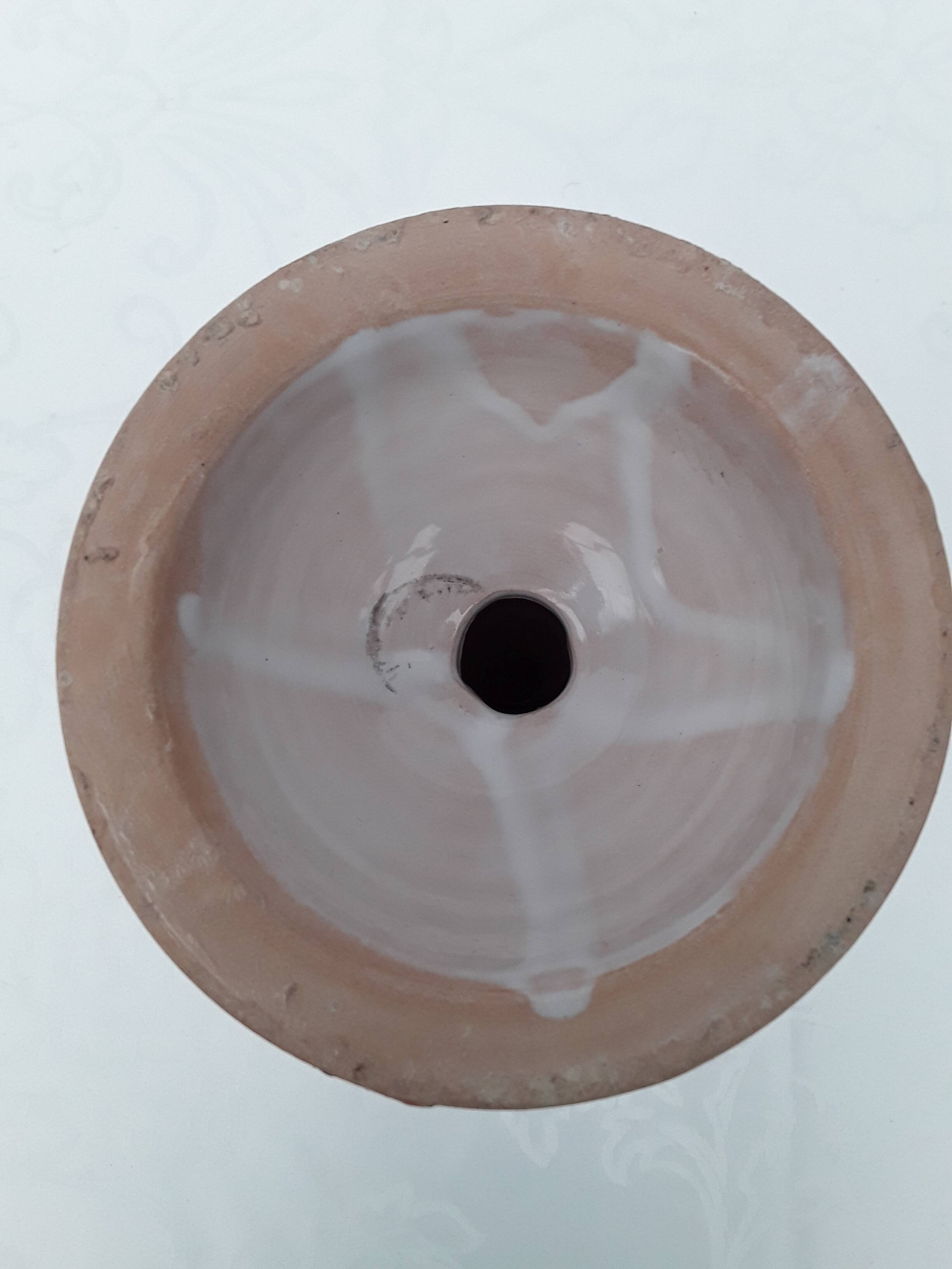 Earthenware candle holder