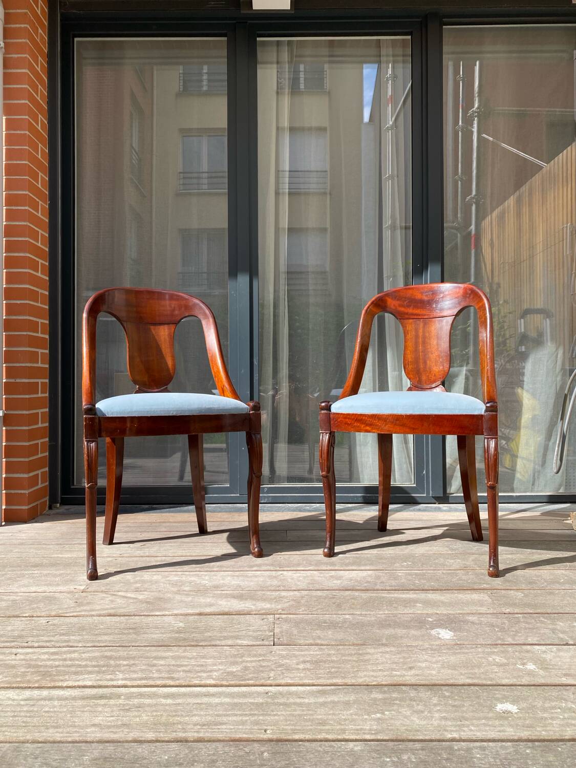Pair of mahogany gondola chairs