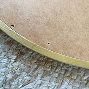 Oval mirror in carved wood