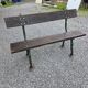 Cast iron garden bench with solid oak seat