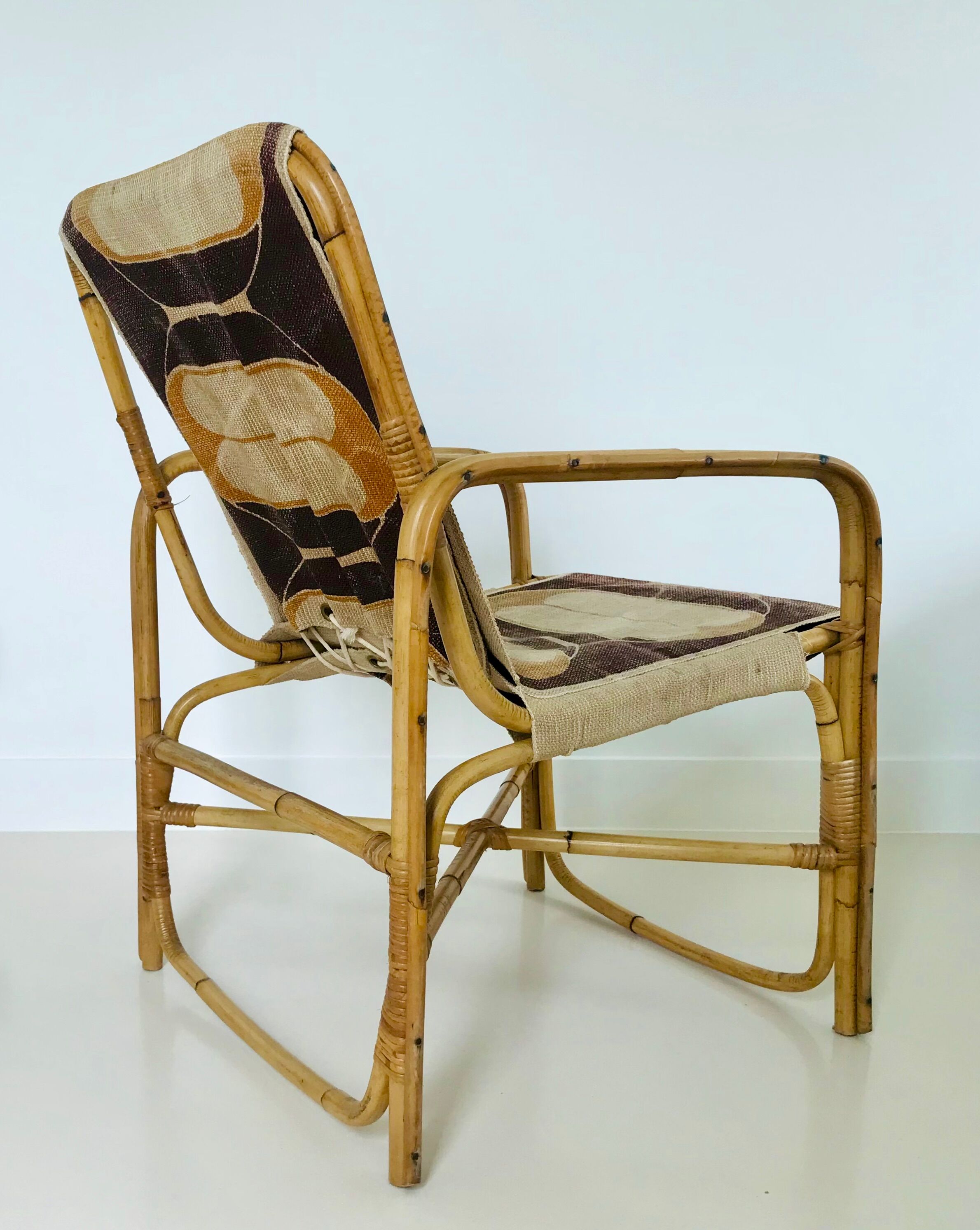 Rattan armchair and fabric, France 60s
