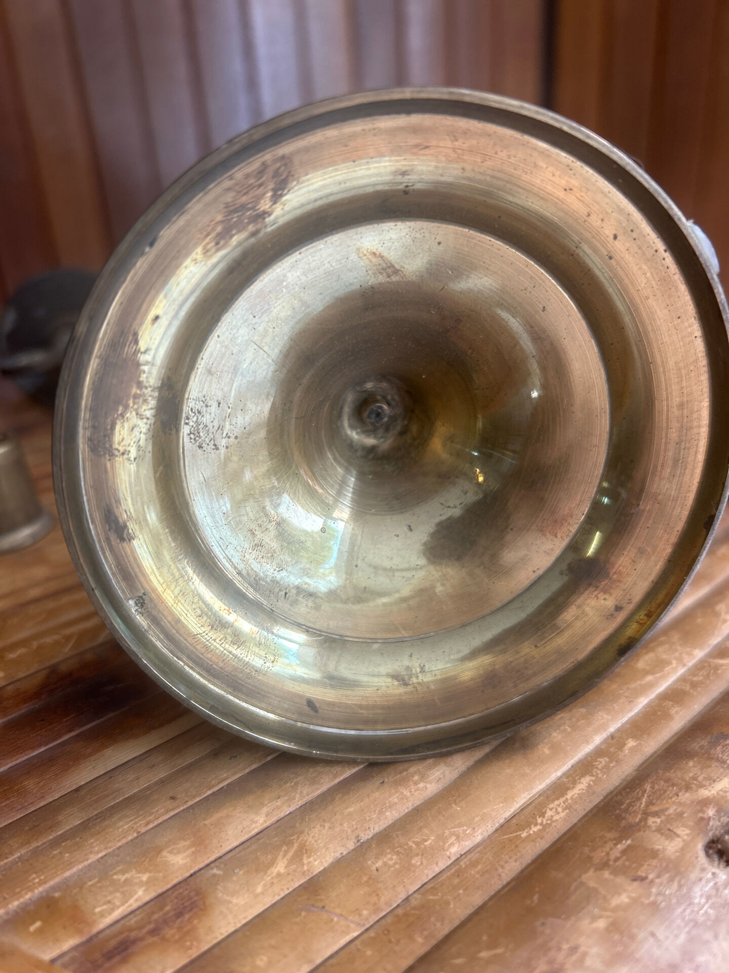 Vintage brass candelabrum engraved with three lights and a snuffer.