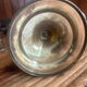 Vintage brass candelabrum engraved with three lights and a snuffer.