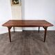 Table à manger en teck avec extension par Johannes Andersen, pour Uldum Møbelfabrik, Danemark, 1960.