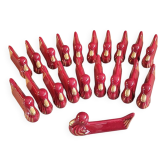 Lot de 20 porte-couteaux canards en porcelaine bordeaux et or