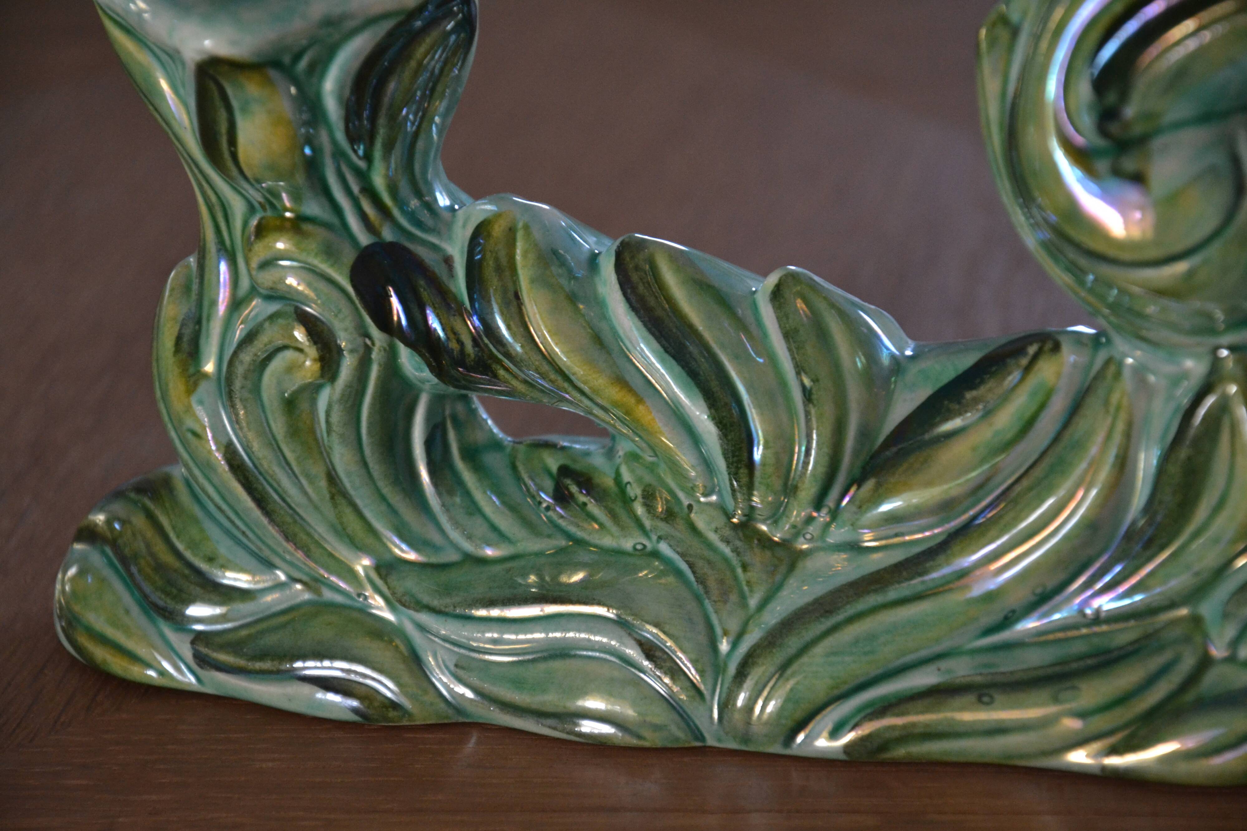 Pair of iridescent green ceramic Art Deco candlesticks