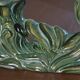 Pair of iridescent green ceramic Art Deco candlesticks