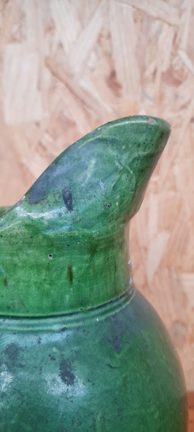 Green varnished stoneware pitcher