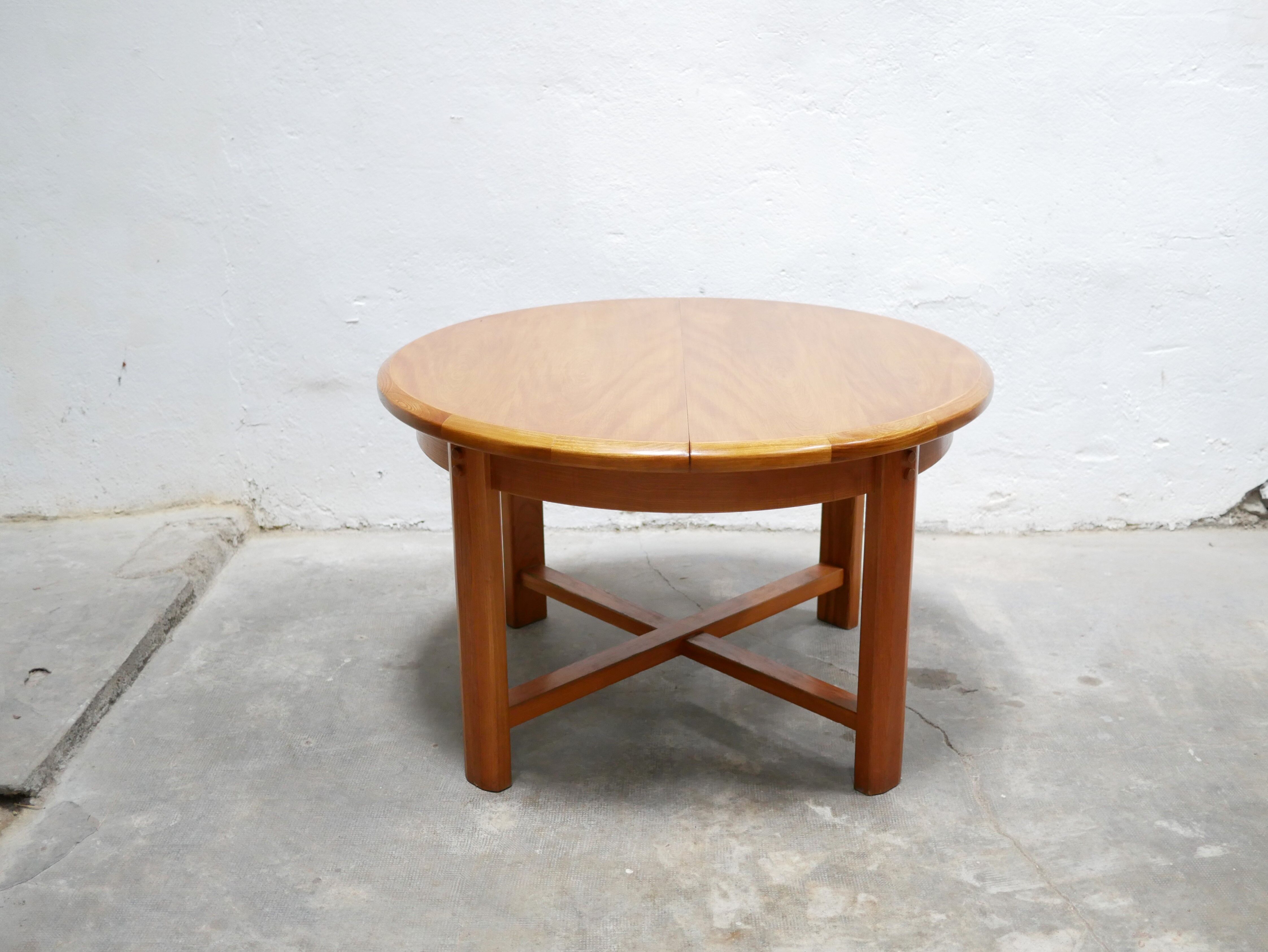 Vintage extendable round wooden dining table