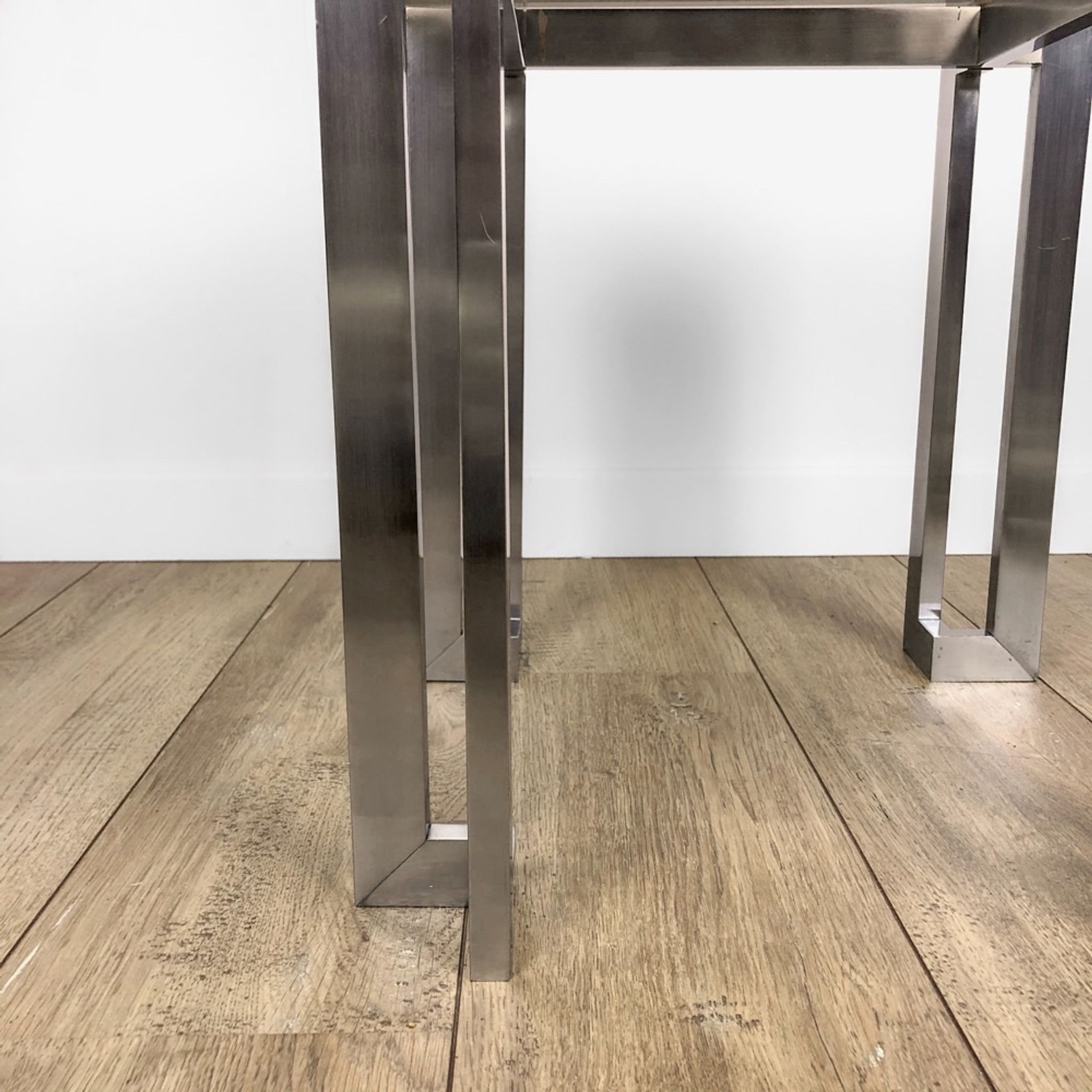 Brushed stainless steel design side table and 70s smoked glass