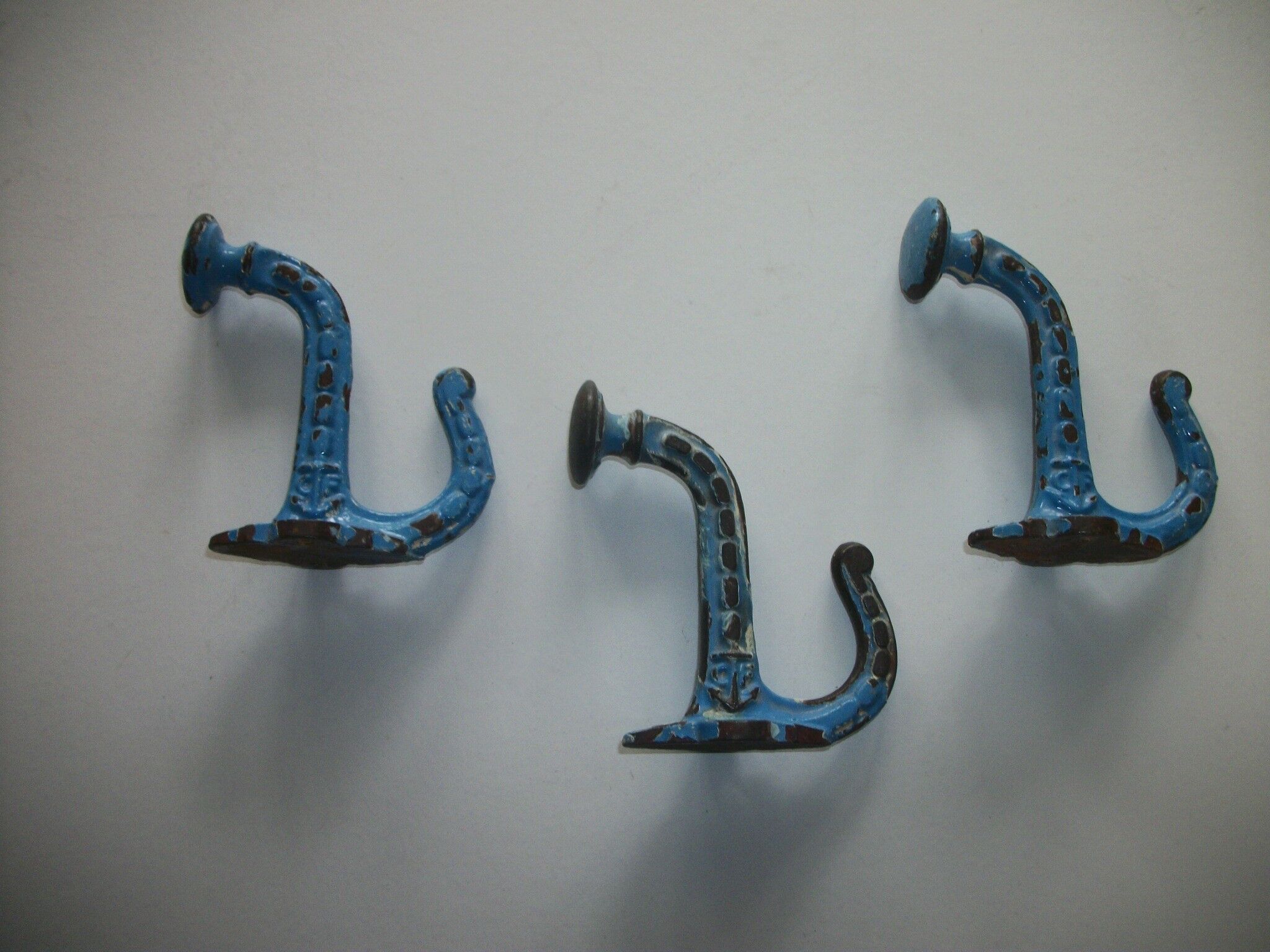 Set of 3 swaddled cast iron hooks