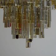 Venetian chandelier in colourless and gold Murano glass, Venini Triedi model, circa 1960.