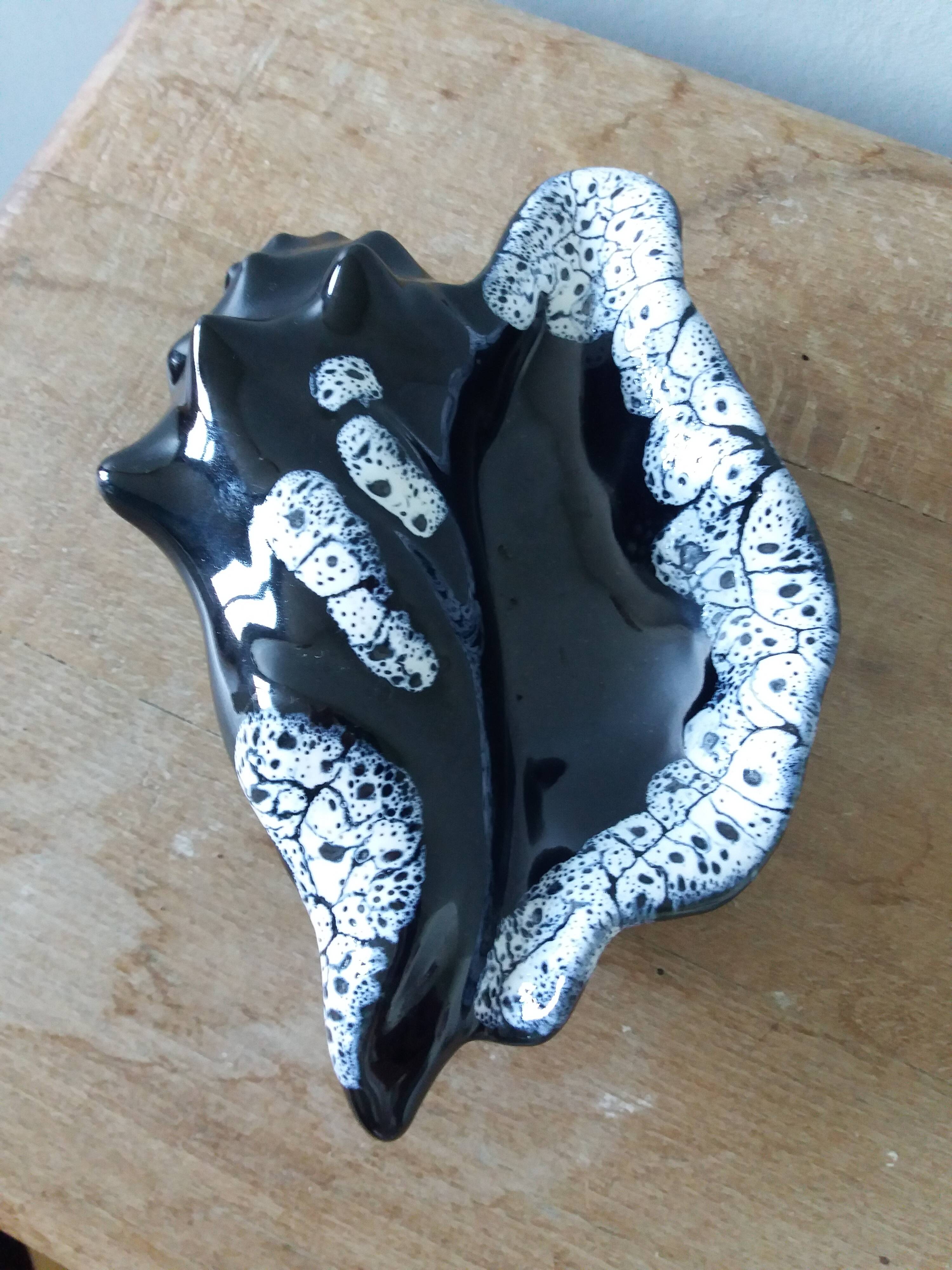 Black ceramic and foam shell ashtray