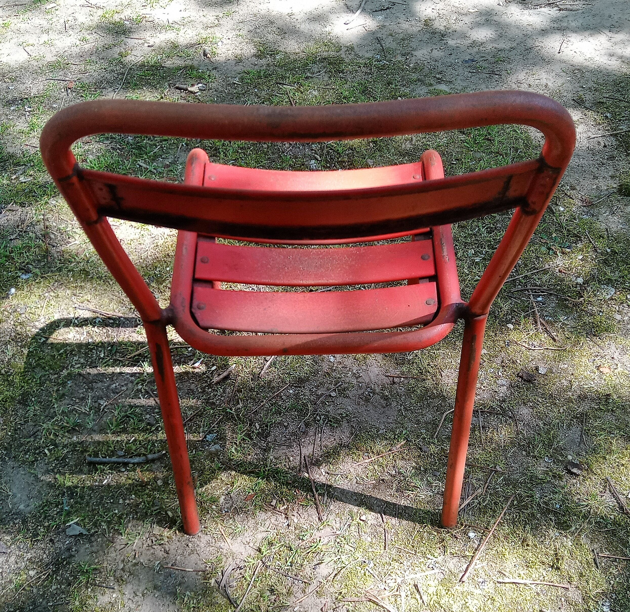 Series of 8 red Tolix chairs