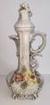 Vintage decorative pitcher in Italian ceramic with raised floral decoration.