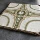 Ceramic tile trivet with vintage pattern woven wicker outline