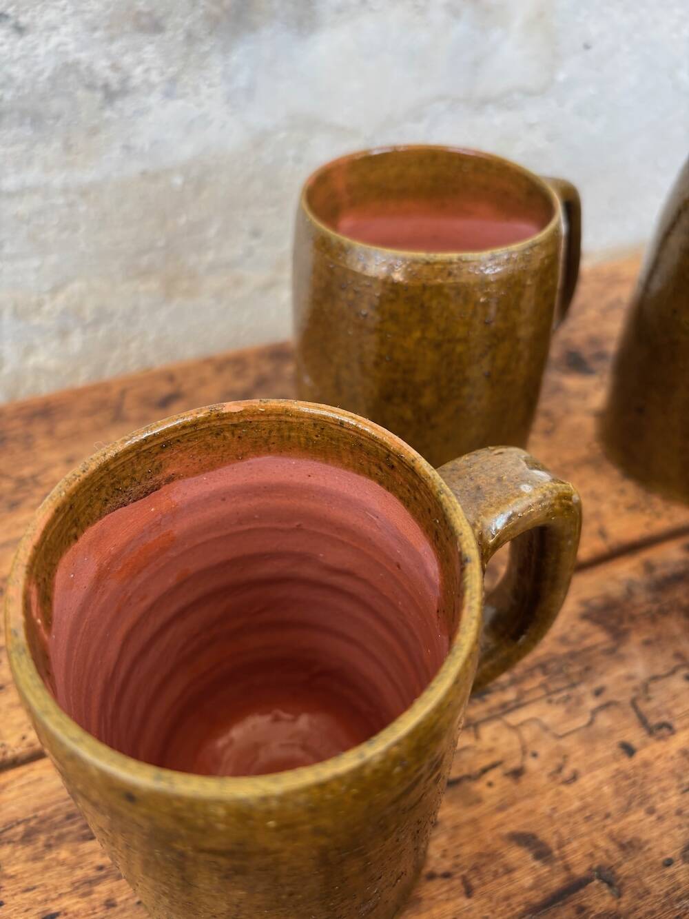 Set of 5 brown stoneware mugs
