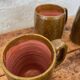 Set of 5 brown stoneware mugs