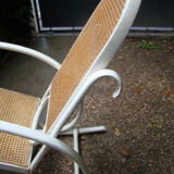 Antique caned rocking chair