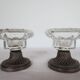 Two candle holders in bronze and crystal