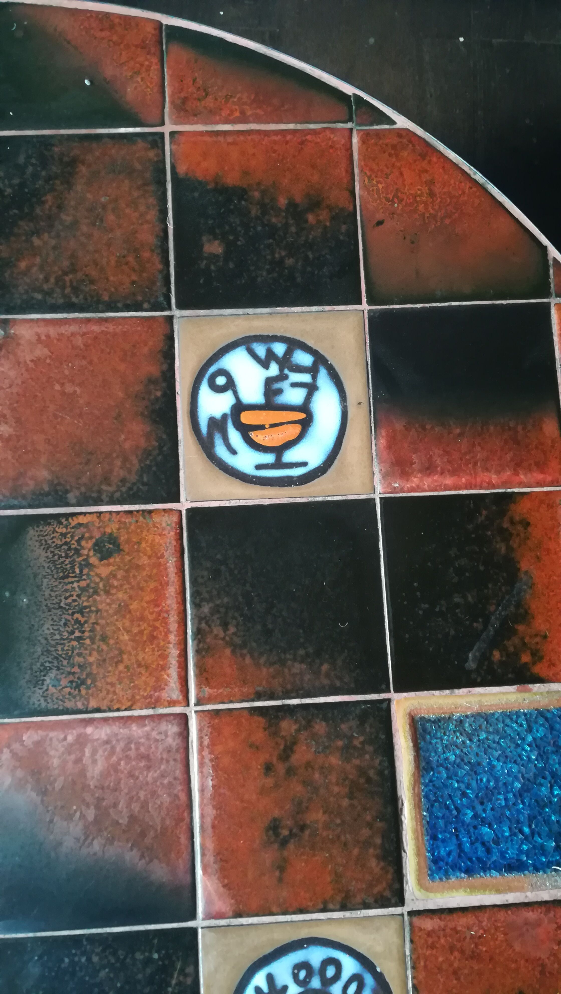 Coffee table, ceramic tray, metal feet, circa 1960