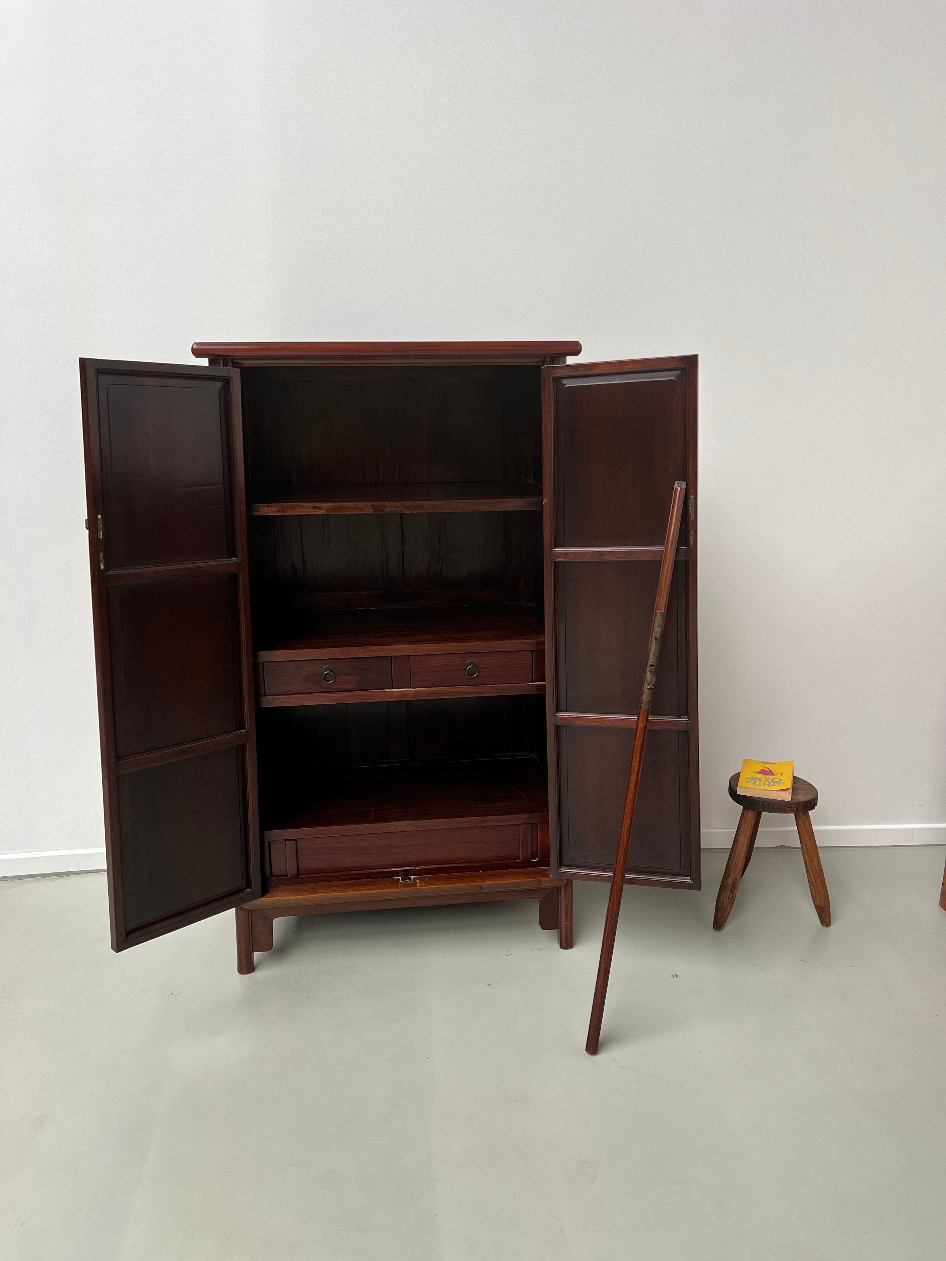 Chinese trapezoidal roller cabinet, made of rosewood.