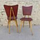 Pair of wooden chairs and red skai, 50s