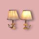Pair of bedside or side fish lamps in gilded brass