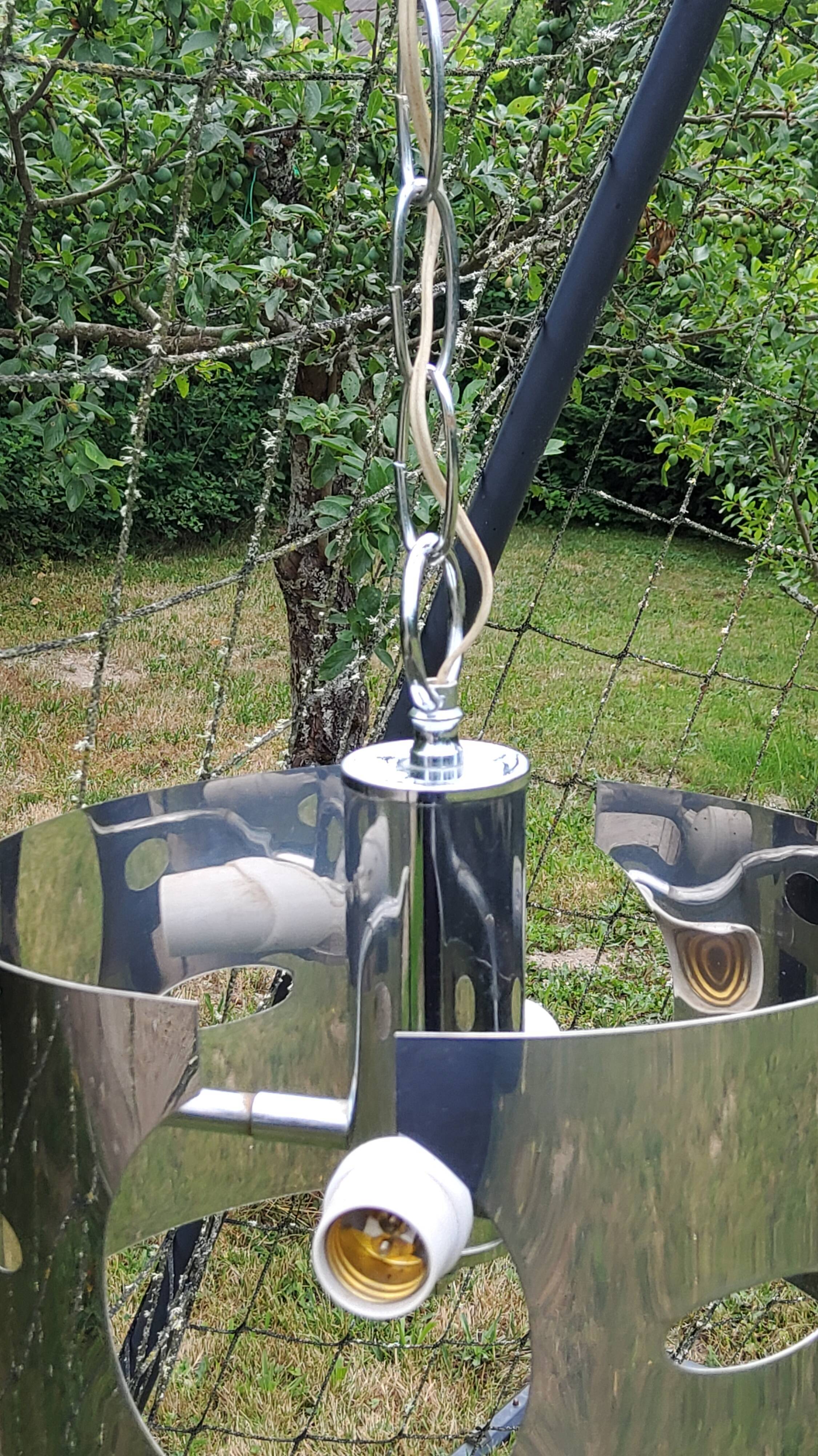 Design chandelier of the 70s in chromed metal