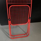 Chaise pliante en métal rouge