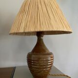 Sandstone lamp and raffia