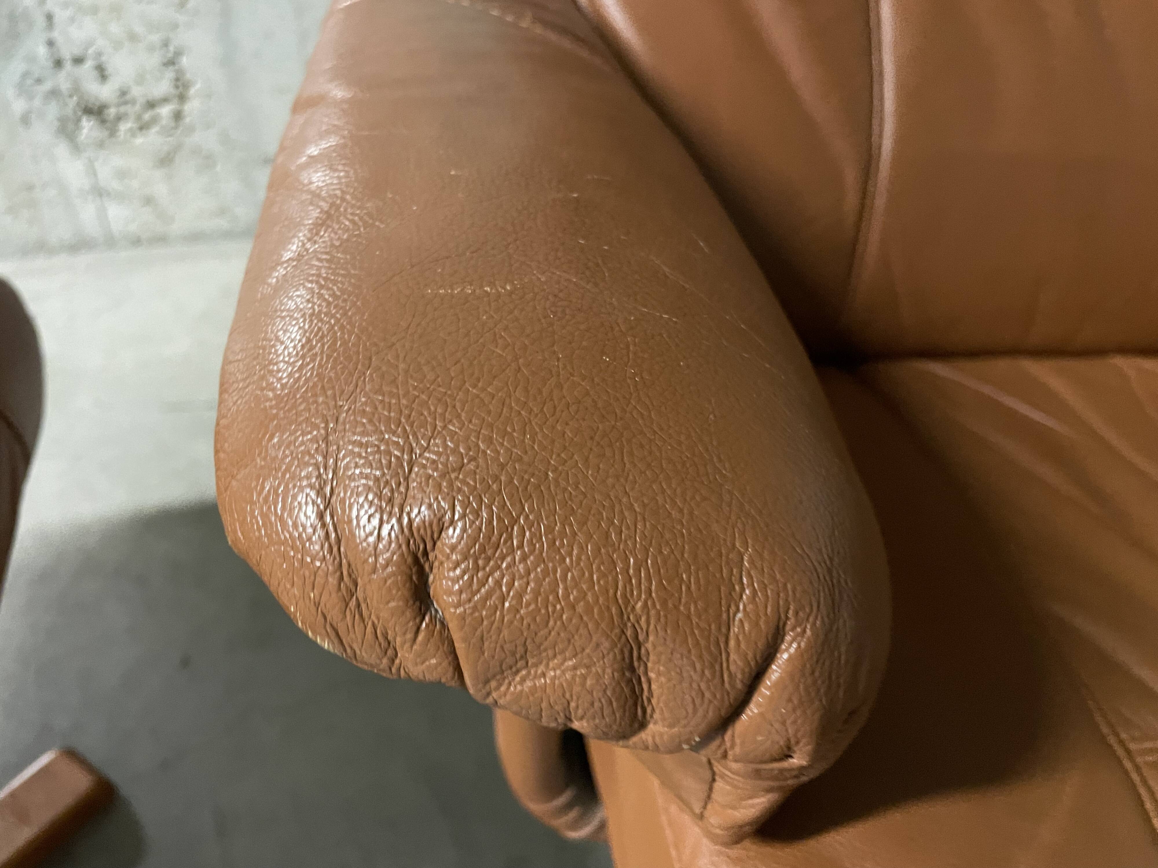 Unico leather armchair and ottoman