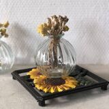 Cast iron trivet with sunflower decor
