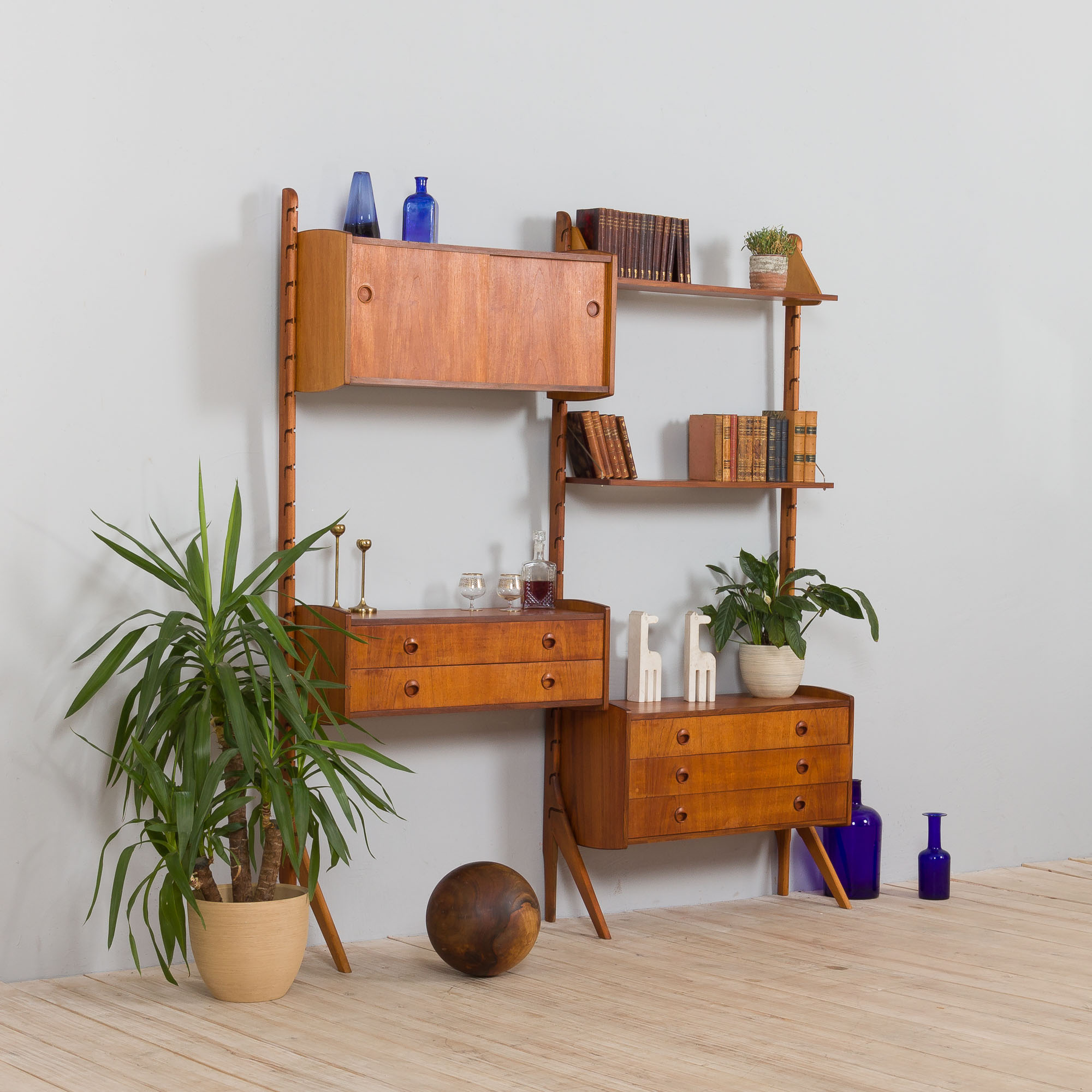 Teak 2-Bay Ergo Modular Wall Unit with double chest of drawers, a cabinet & 2 shelves by John Texmon