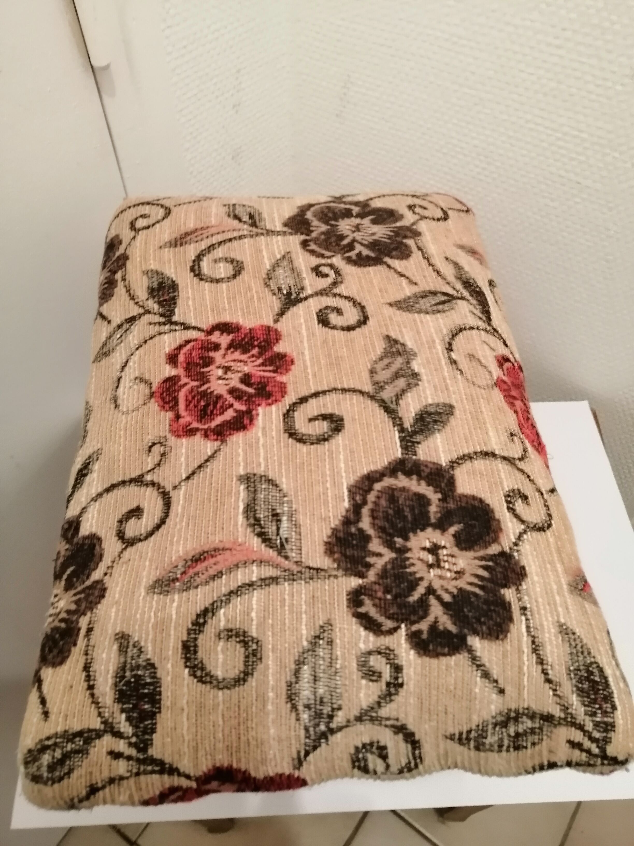 Antique footrest stool in wood and fabric