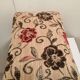 Antique footrest stool in wood and fabric