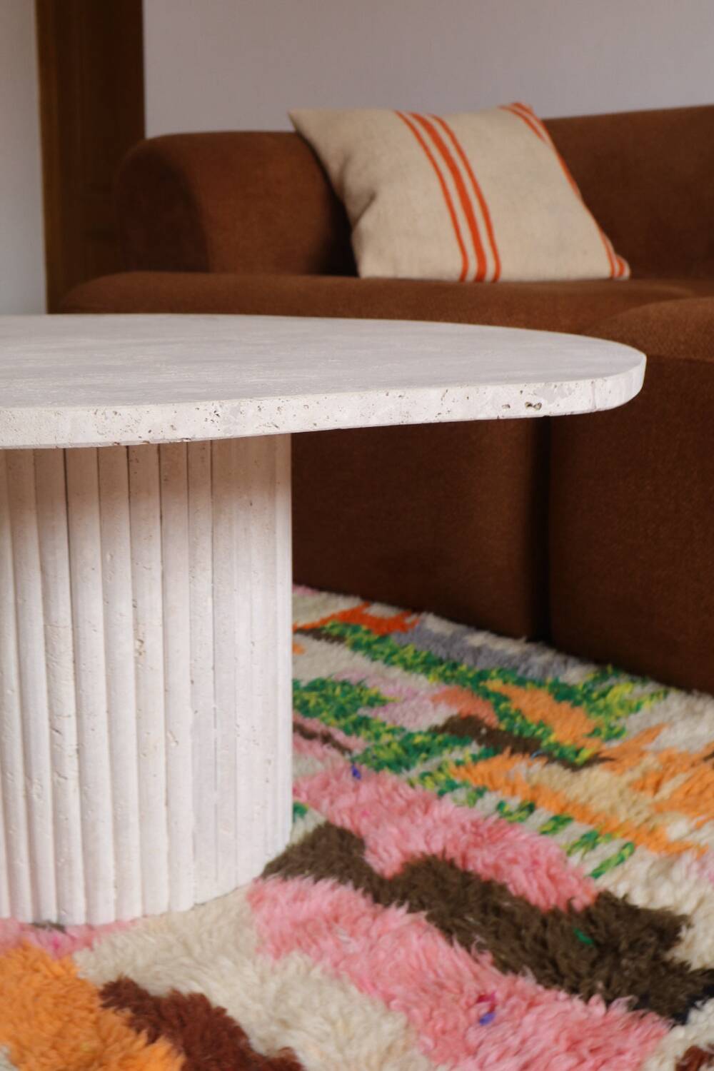 Organic shape travertine coffee table