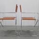 1970s pair of Italian folding chairs with leatherette upholstery