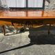 Antique extendable table in cherry wood and marquetry in the Louis XV style.