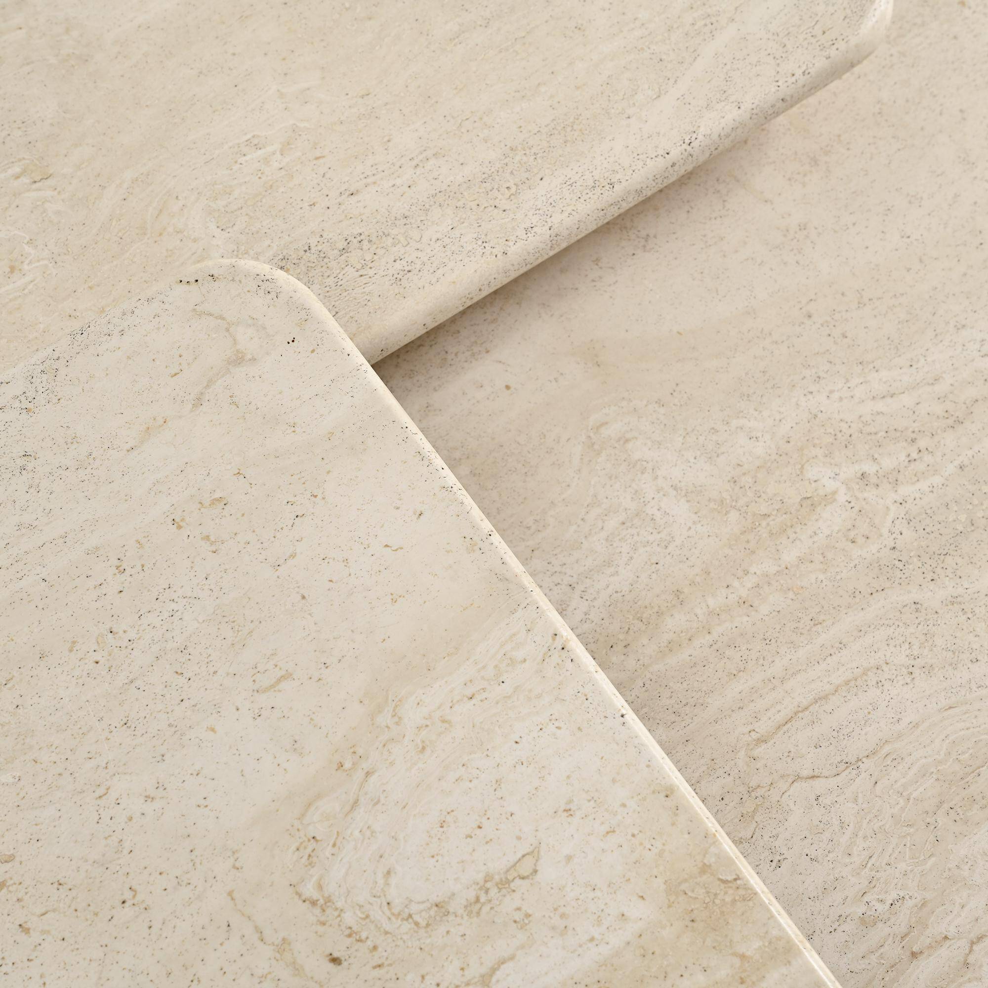 Set of three nesting tables in travertine, Italy circa 1970.