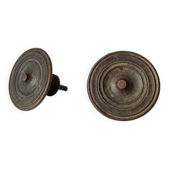 Pair of antique Empire furniture knobs from the 19th century.