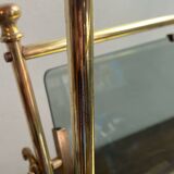 Brass magazine rack and blue-tinted glasses, 1950s.