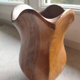 Olive wood pitcher.
