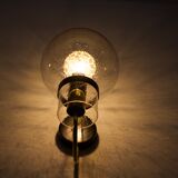 Wall lights with blown glass globes.