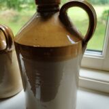 Duo of stoneware decanter bottles