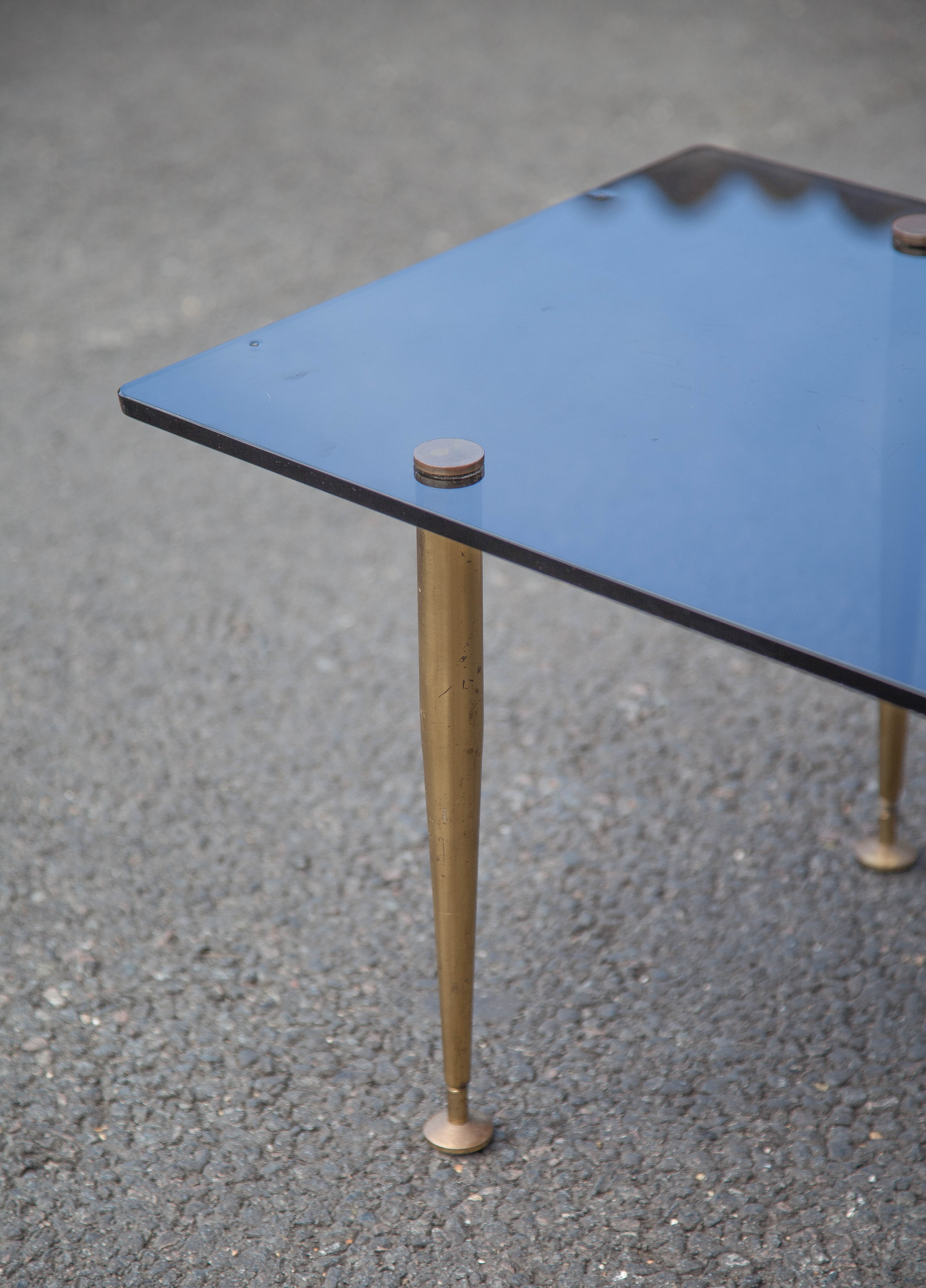 Smoked glass coffee table with adjustable brass legs, end of sofa, 70s table