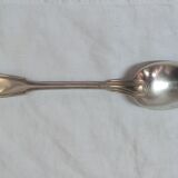 Serving spoon, silver metal.