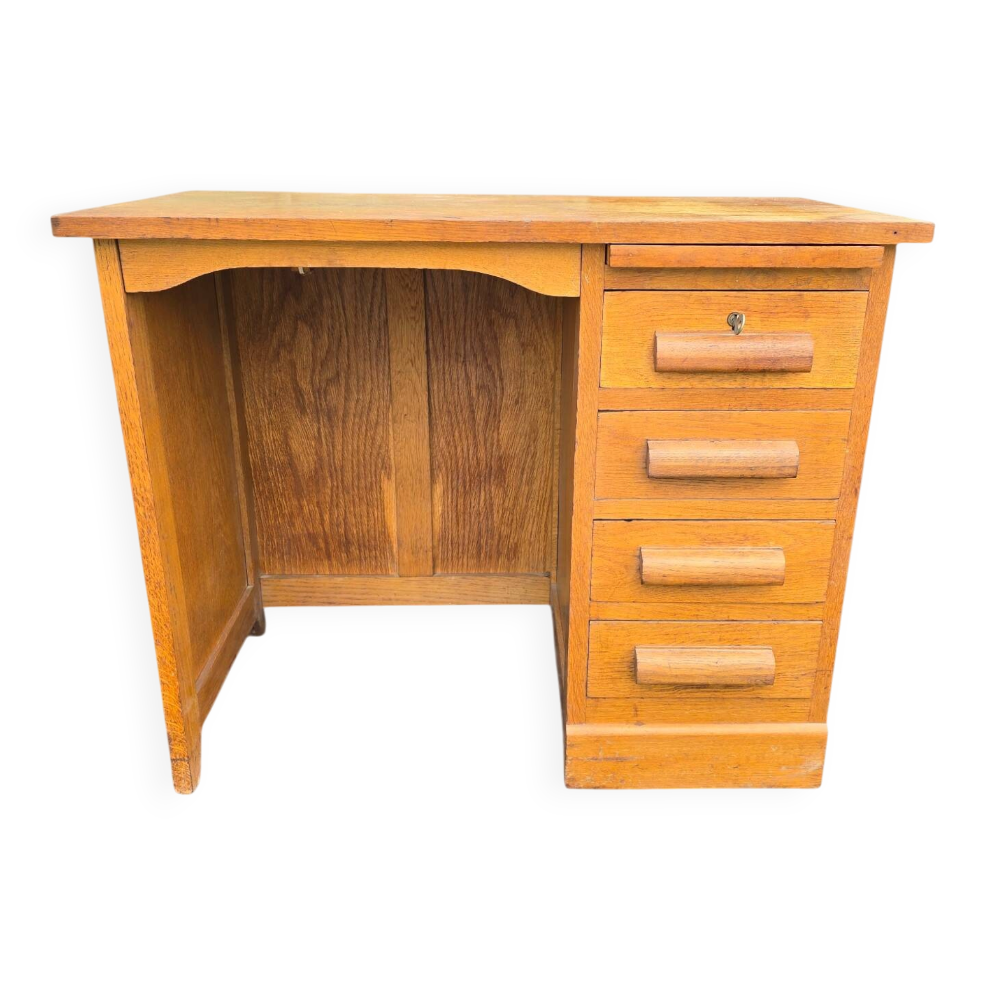 Vintage oak desk with a drawer unit and sliding shelf.