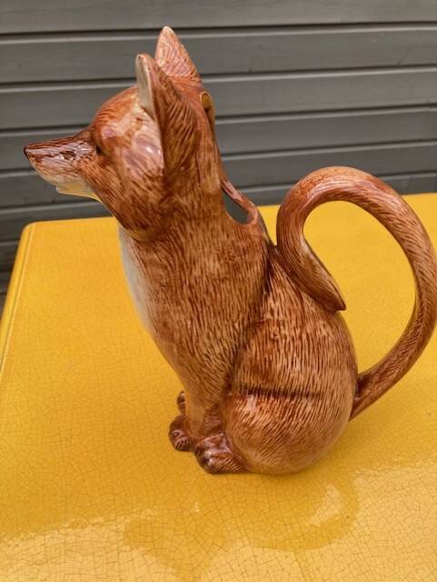 Ceramic jug in the shape of a fox.
