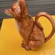 Ceramic jug in the shape of a fox.